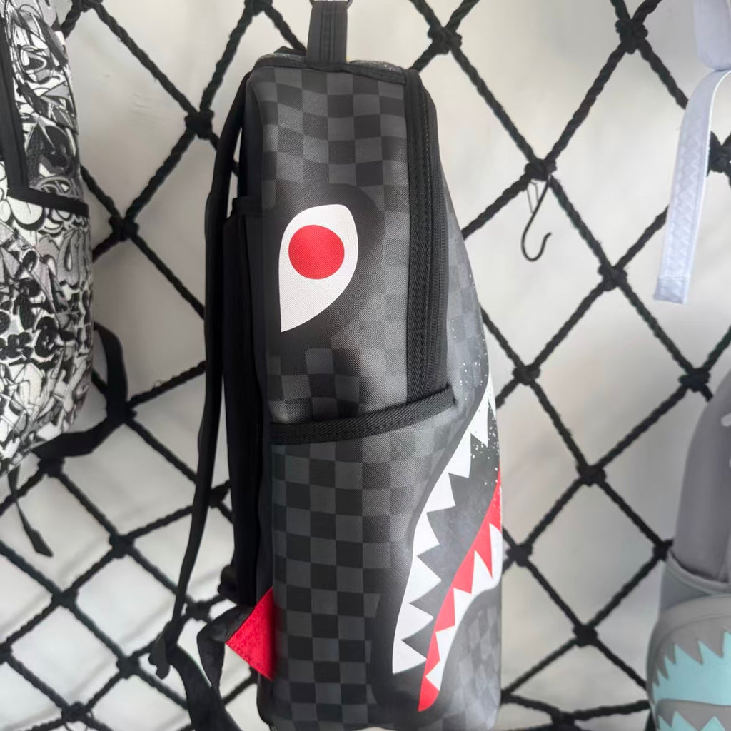 Urban Streetwear Backpack – Black & White Scribble Checkerboard with Shark Mouth and Splatter Design