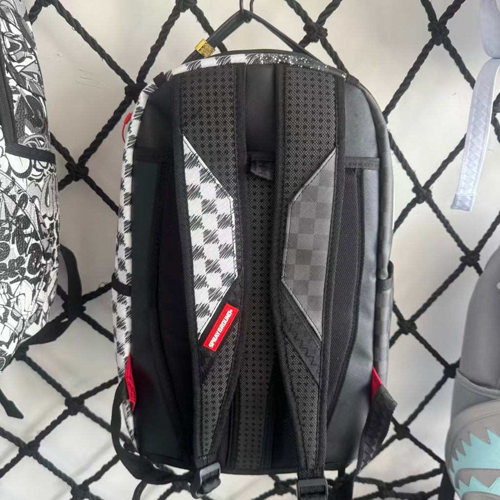 Urban Streetwear Backpack – Black & White Scribble Checkerboard with Shark Mouth and Splatter Design