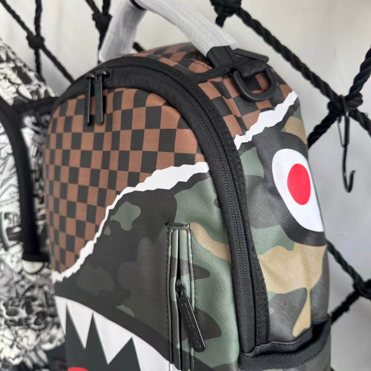 Urban Streetwear Backpack – Brown & Black Checkerboard Camo Torn-Paper Shark Mouth Design