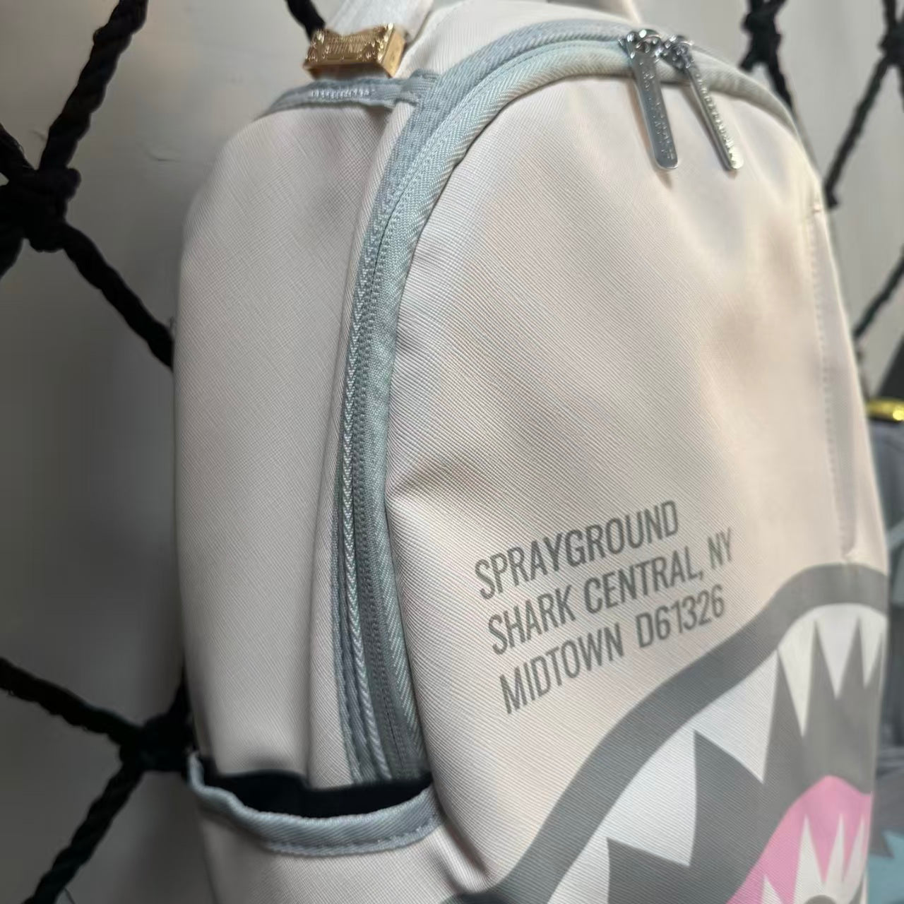 Cream Streetwear Backpack - New York Text Print with Grey & Pink Shark Mouth Design