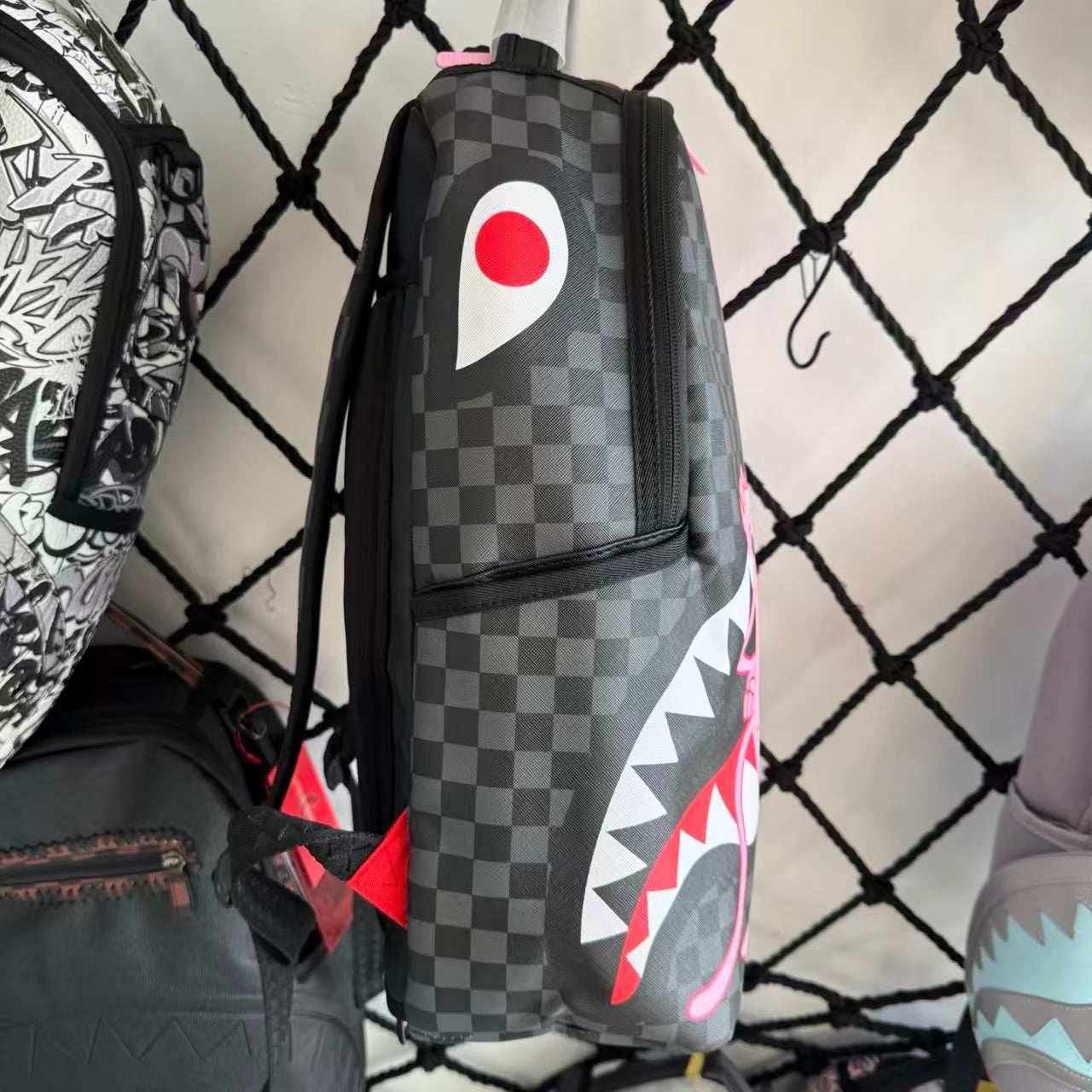 Pink Panther Themed Streetwear Backpack – Melting Pink Ice Cream with Checkerboard and Shark Mouth Design