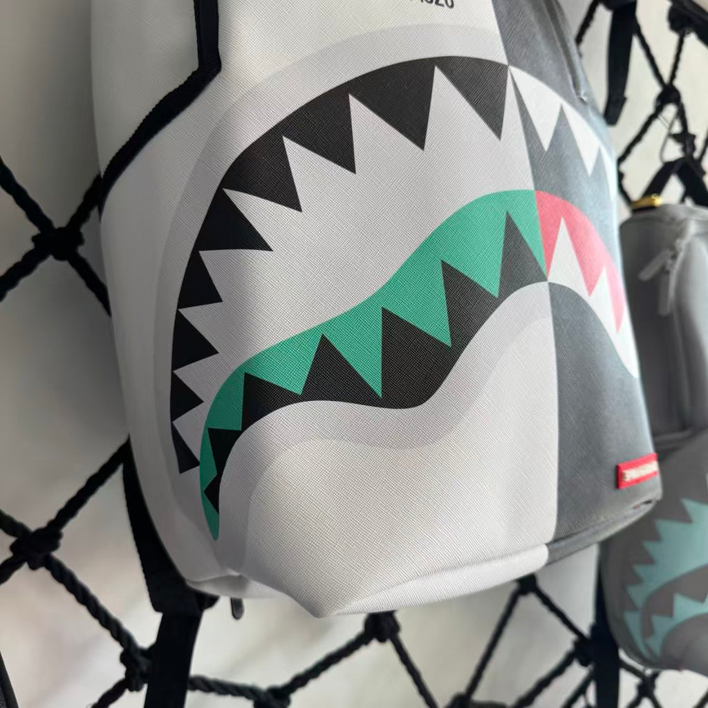Black and White Split-Design Streetwear Backpack - Red and Green Contrast Shark Mouth with Text Print