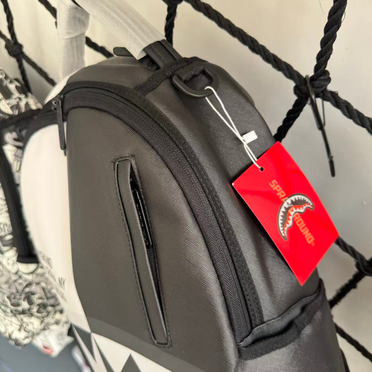 Black and White Split-Design Streetwear Backpack - Red and Green Contrast Shark Mouth with Text Print