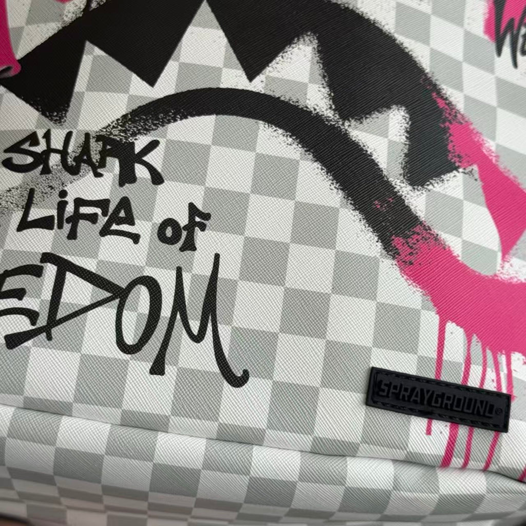 Pink Graffiti Splatter Streetwear Backpack - Grey Checkerboard with Handwritten Slogans and Shark Mouth Design