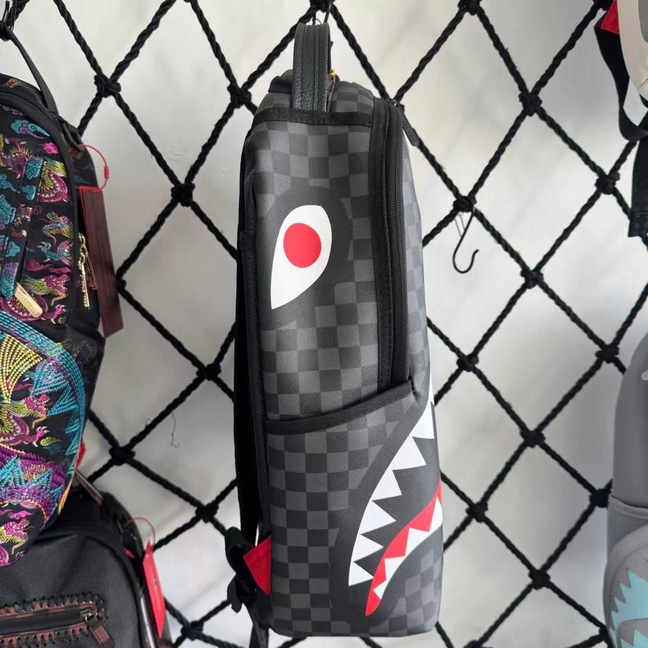 Black & White Checkerboard and Black Pebbled Leather Streetwear Backpack - Ripped 3D Dripping Shark Mouth Design
