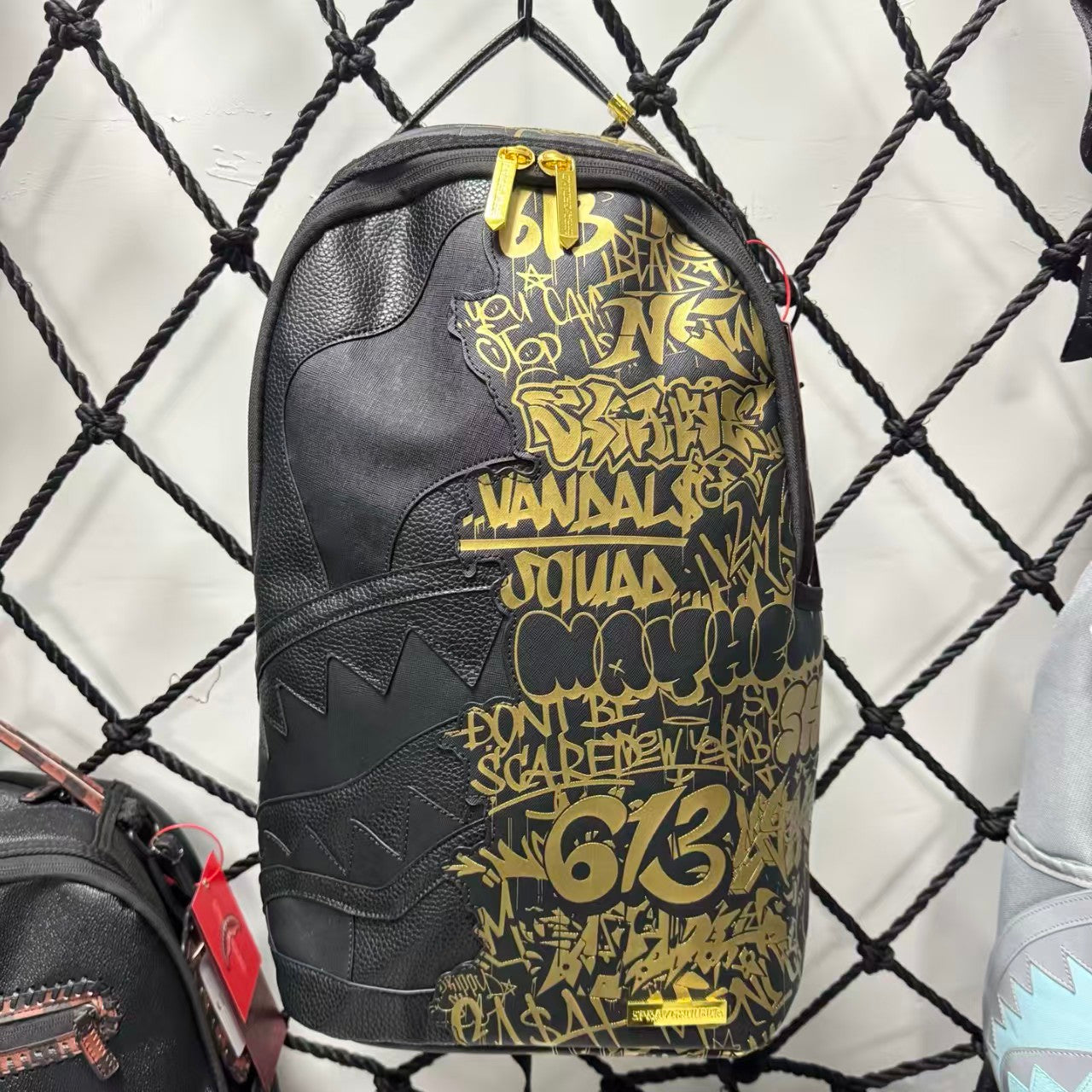 Black Textured Leather Streetwear Backpack - Gold Graffiti Lettering & 3D Shark Mouth Silhouette Design