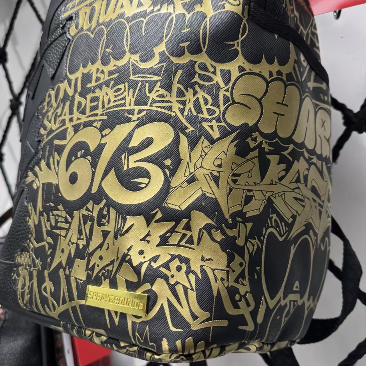 Black Textured Leather Streetwear Backpack - Gold Graffiti Lettering & 3D Shark Mouth Silhouette Design
