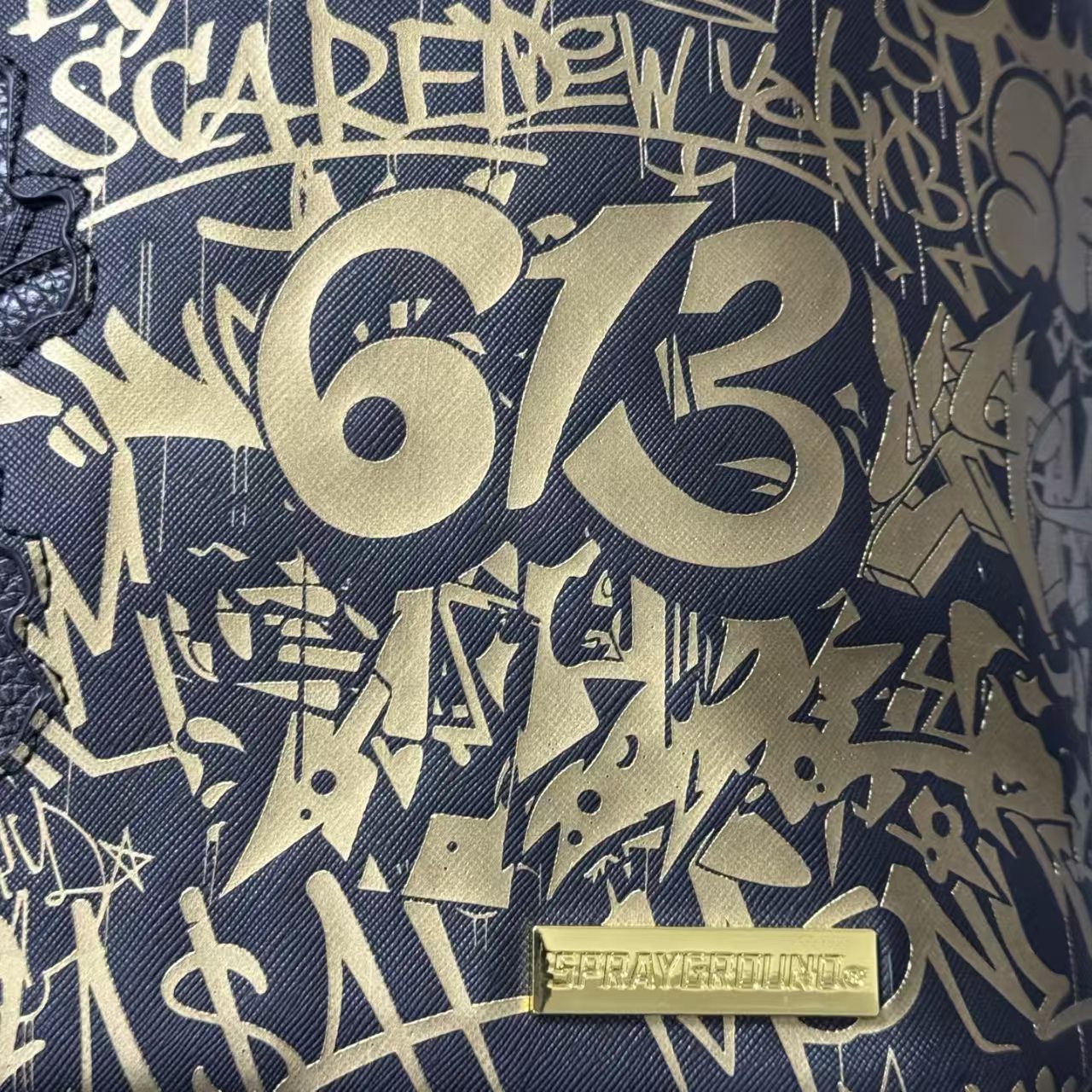 Black Textured Leather Streetwear Backpack - Gold Graffiti Lettering & 3D Shark Mouth Silhouette Design