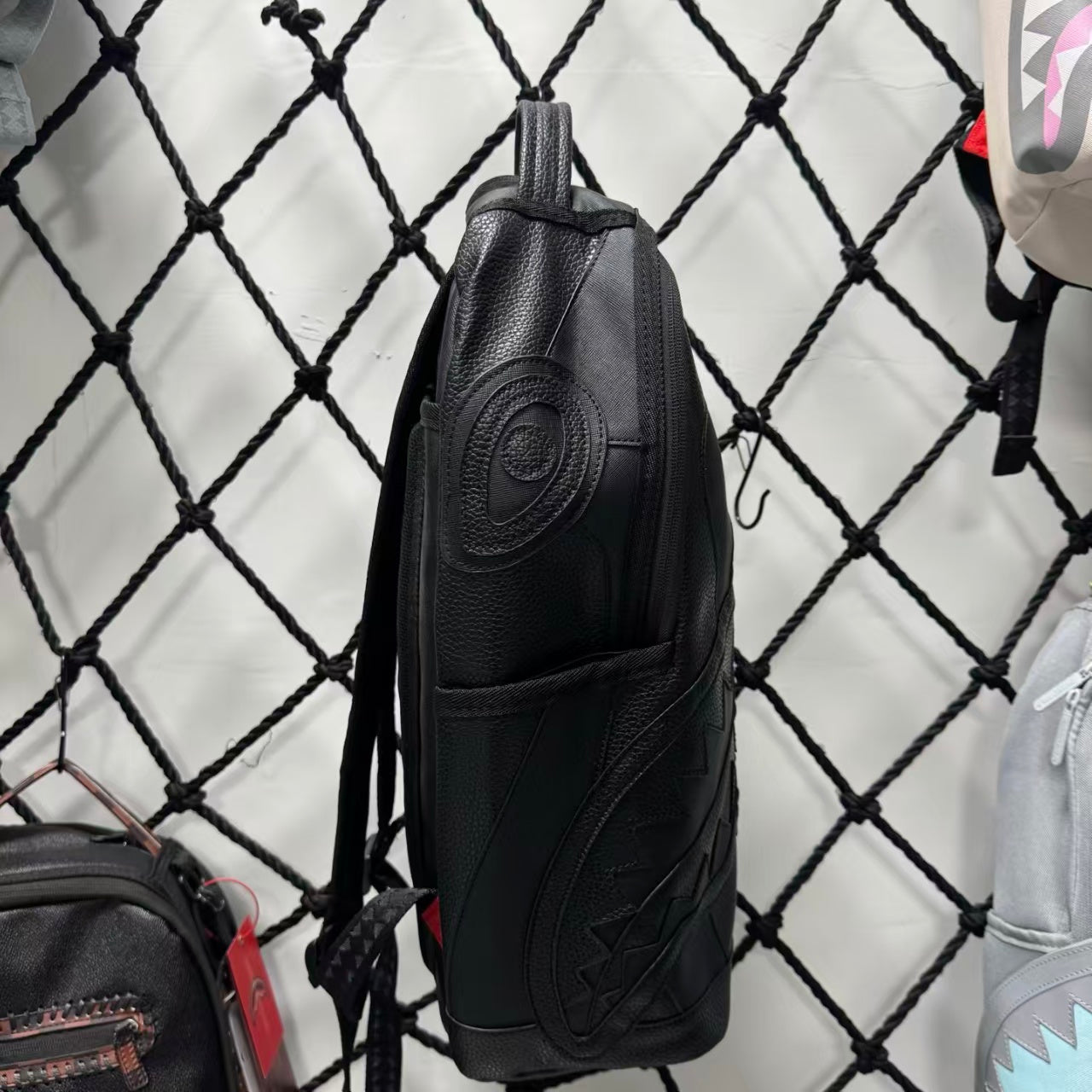 Black Textured Leather Streetwear Backpack - Gold Graffiti Lettering & 3D Shark Mouth Silhouette Design