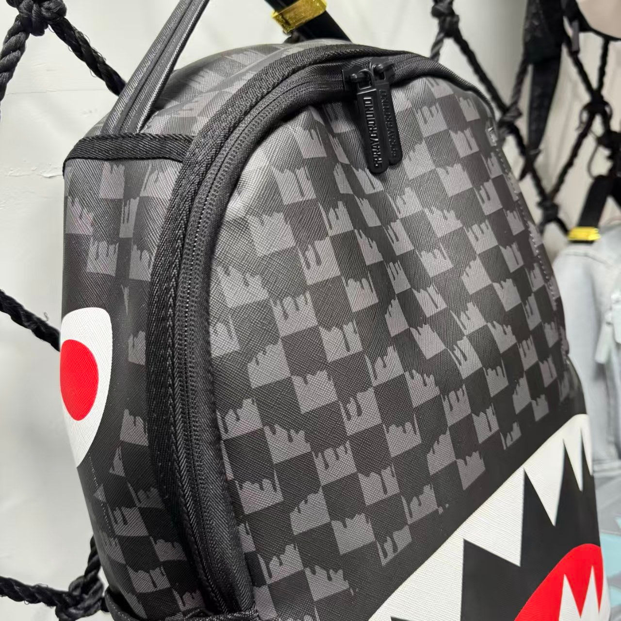 Black Subtle Checkered Pattern Streetwear Backpack - Classic Red, White and Black Shark Mouth Design
