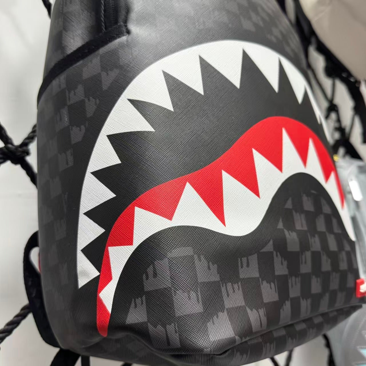 Black Subtle Checkered Pattern Streetwear Backpack - Classic Red, White and Black Shark Mouth Design