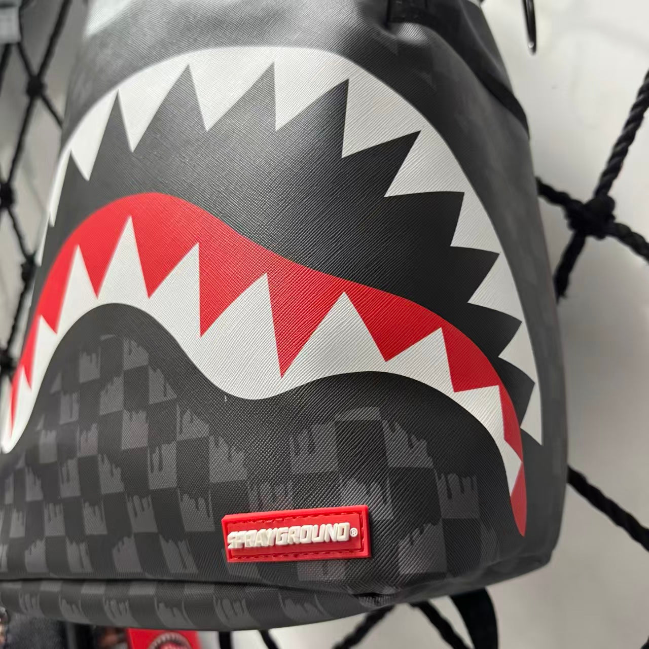 Black Subtle Checkered Pattern Streetwear Backpack - Classic Red, White and Black Shark Mouth Design