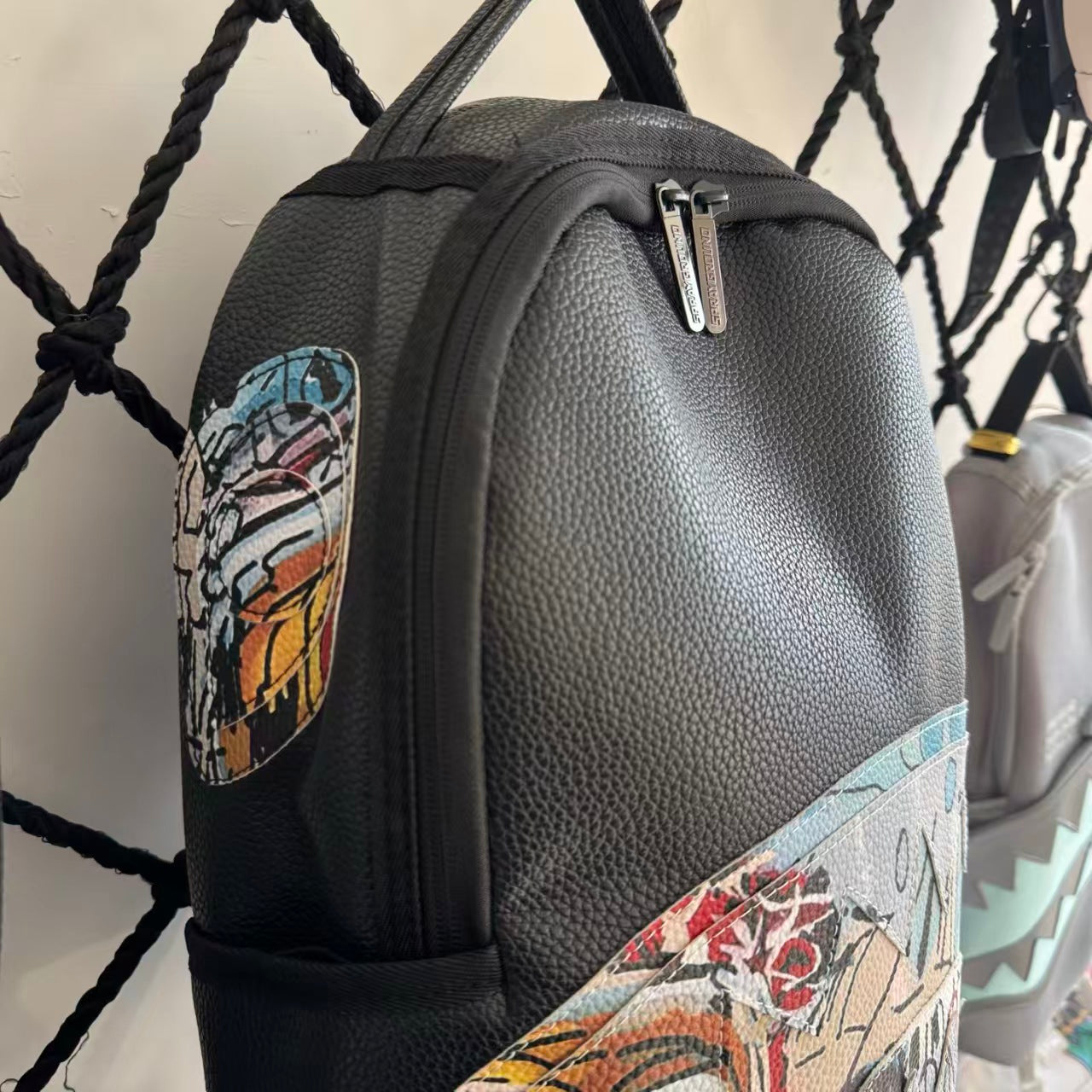 Black Pebbled Leather Backpack with Abstract Art Graffiti Splicing - Colorful Print Design