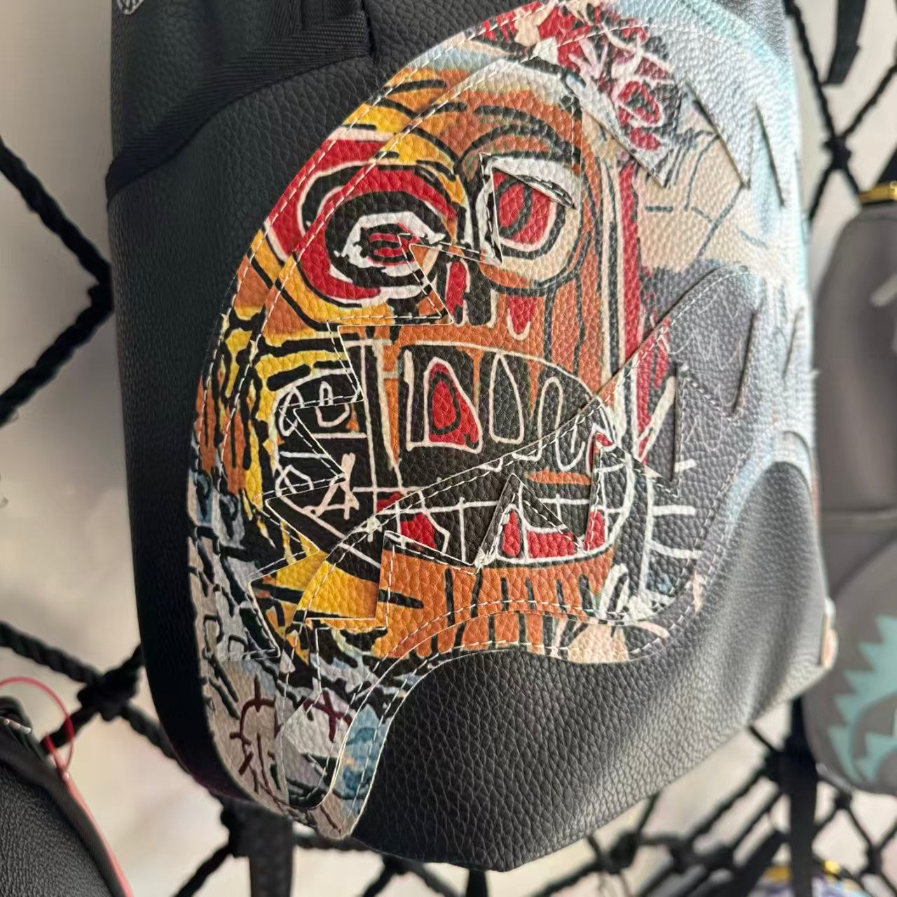 Black Pebbled Leather Backpack with Abstract Art Graffiti Splicing - Colorful Print Design