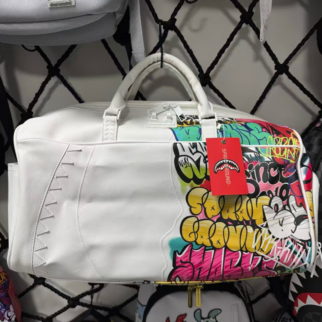 White Graffiti Spliced Duffle Bag - Stitched Shark Teeth Texture with Colorful Pattern Design