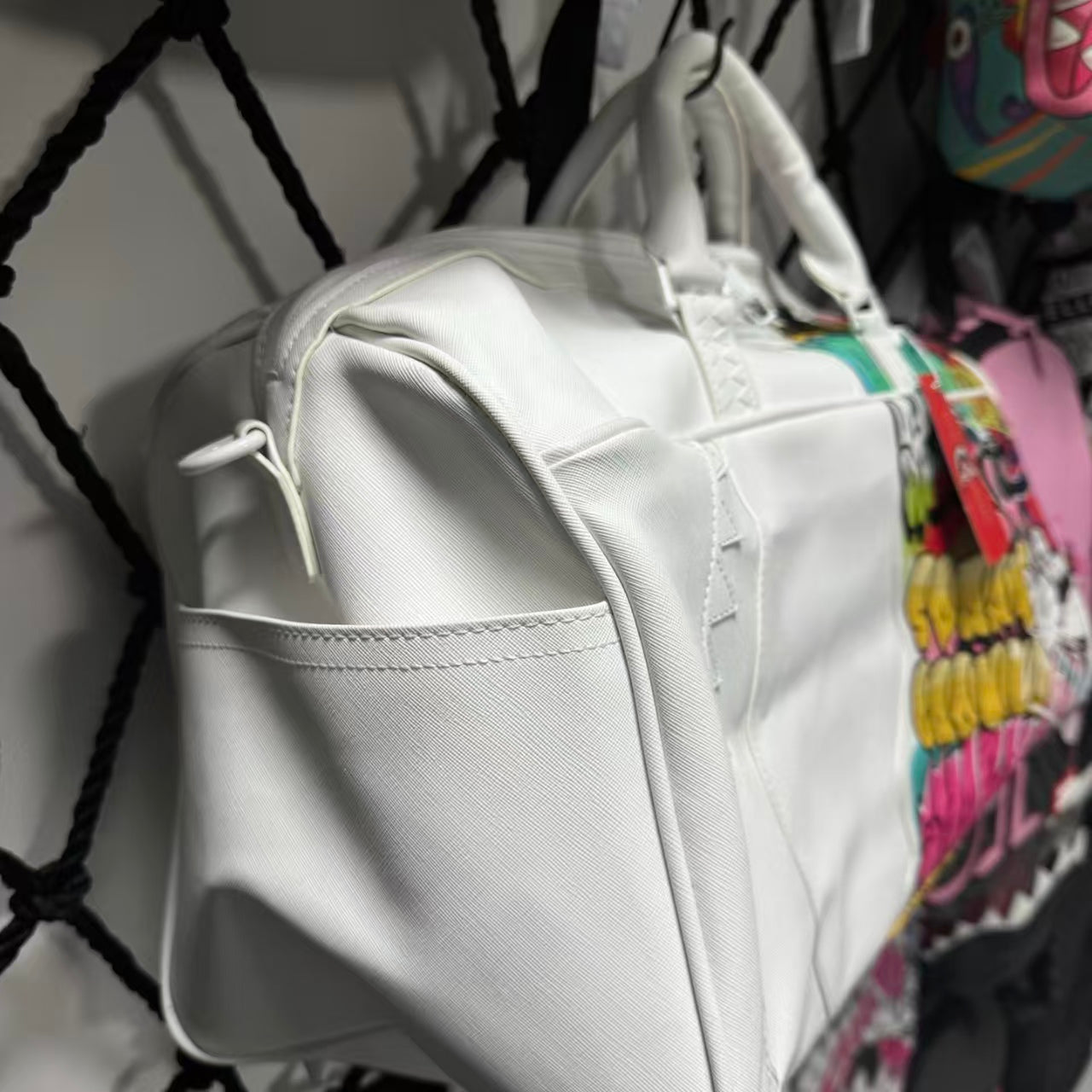 White Graffiti Spliced Duffle Bag - Stitched Shark Teeth Texture with Colorful Pattern Design