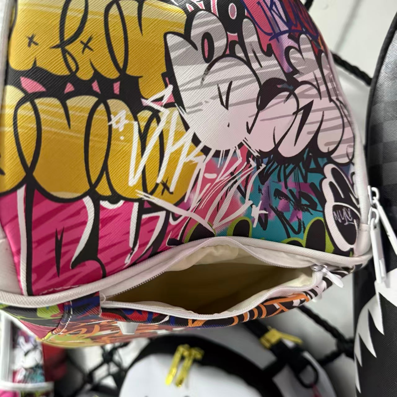 White Graffiti Spliced Duffle Bag - Stitched Shark Teeth Texture with Colorful Pattern Design