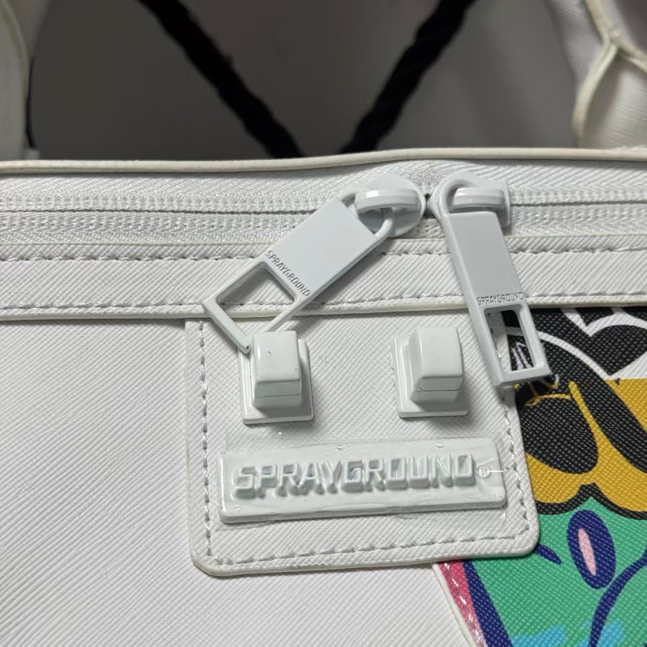 White Graffiti Spliced Duffle Bag - Stitched Shark Teeth Texture with Colorful Pattern Design