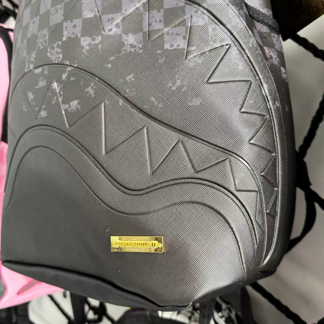 Black & Grey Checkerboard Backpack with 3D Embossed Shark Mouth Design