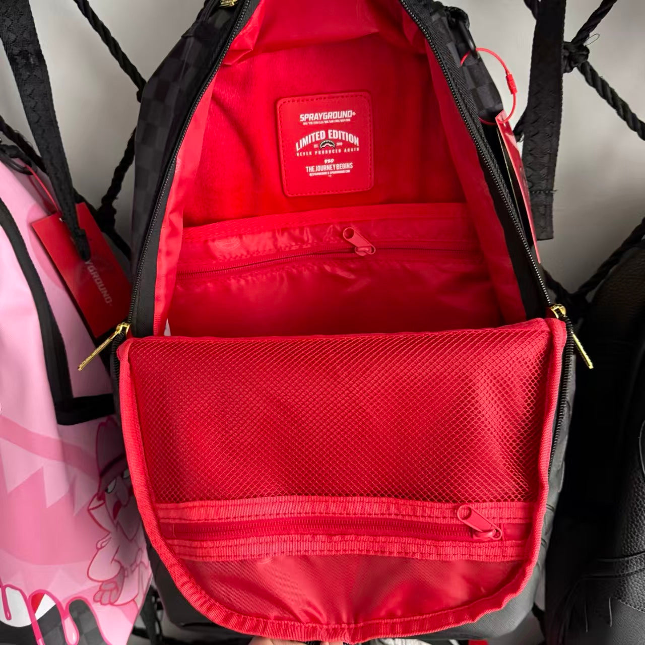 Black & Grey Checkerboard Backpack with 3D Embossed Shark Mouth Design