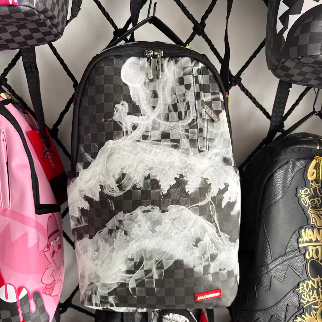Black & Grey Checkerboard Backpack with Swirling White Smoke Effect