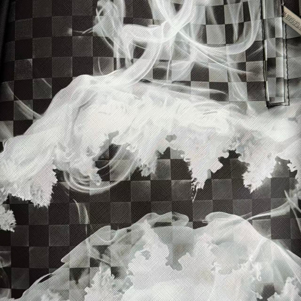 Black & Grey Checkerboard Backpack with Swirling White Smoke Effect