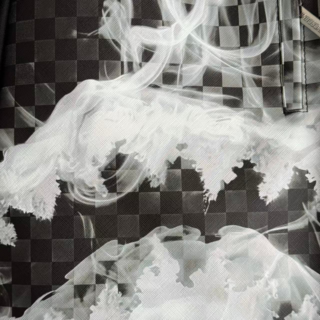 Black & Grey Checkerboard Backpack with Swirling White Smoke Effect