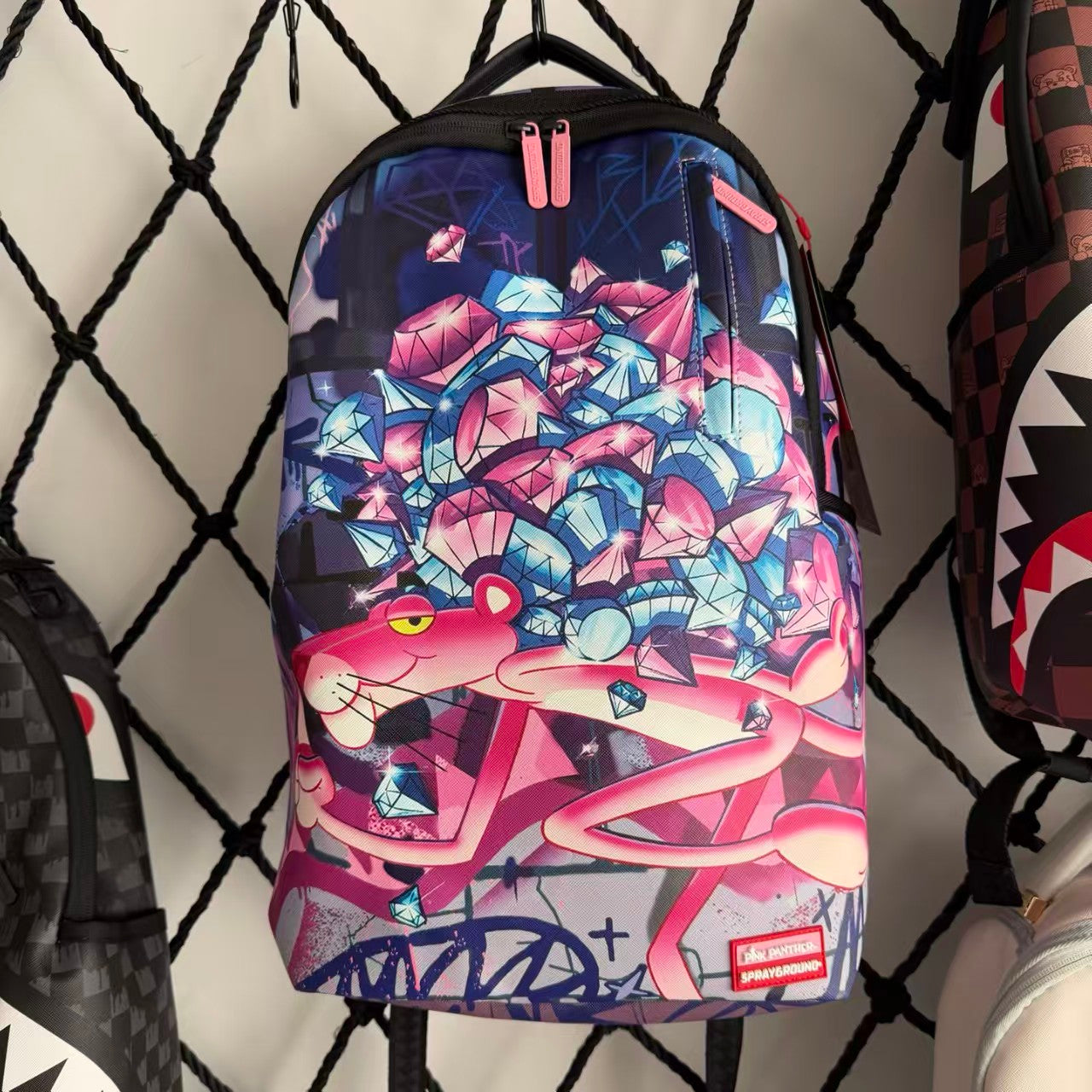 Pink Panther Themed Streetwear Backpack - Dreamy Blue Purple Background with Sparkling Diamond Pile Design